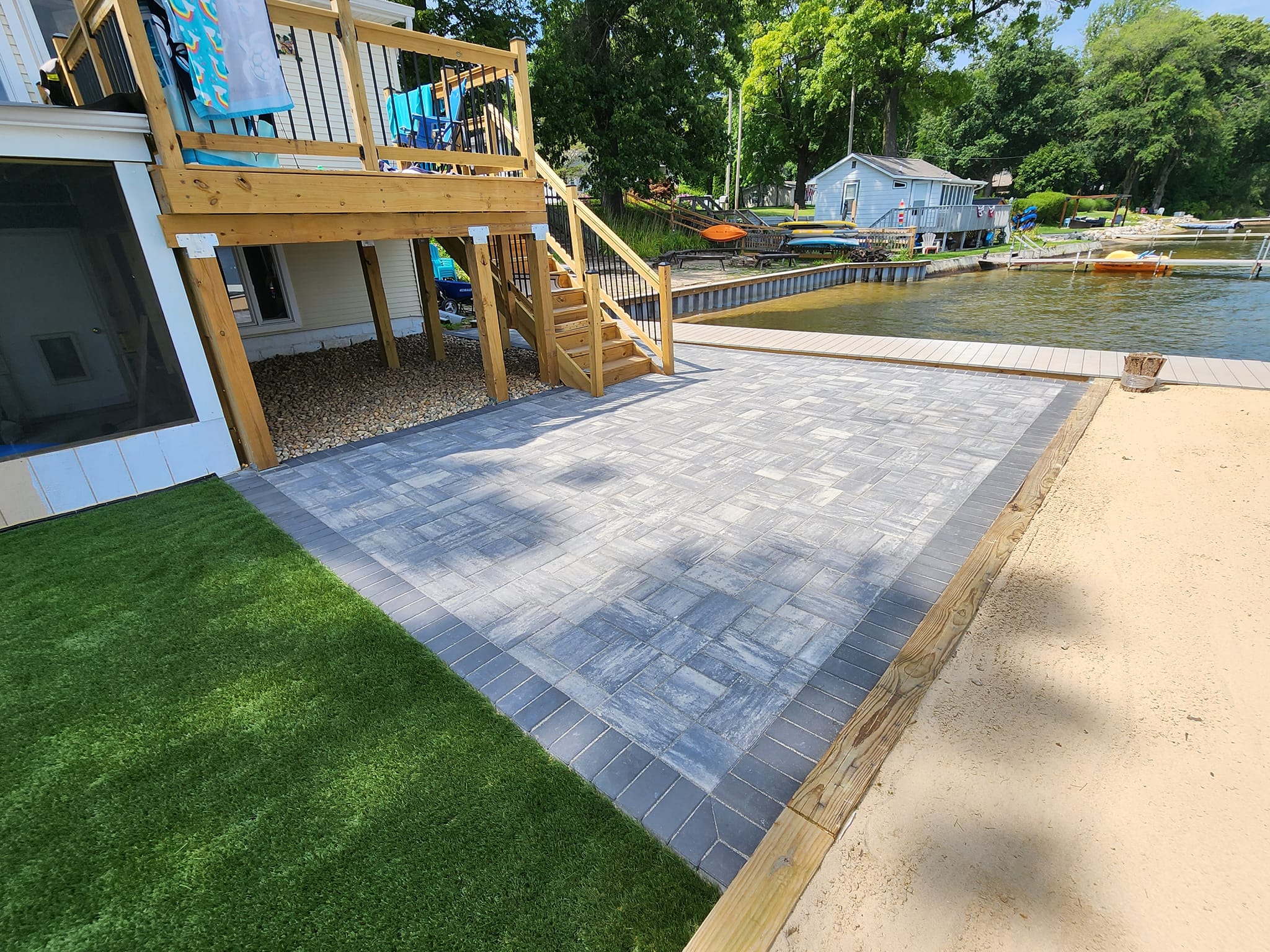 Lakefront paver patio installation
