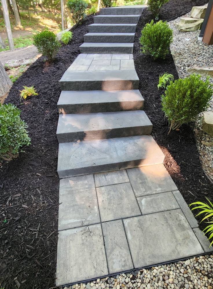 Custom paver steps with mulch bed landscaping